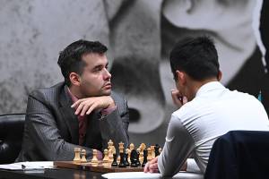 В третьей партии матча за шахматную корону Ян Непомнящий Динь Лижэнь сыграли вничью